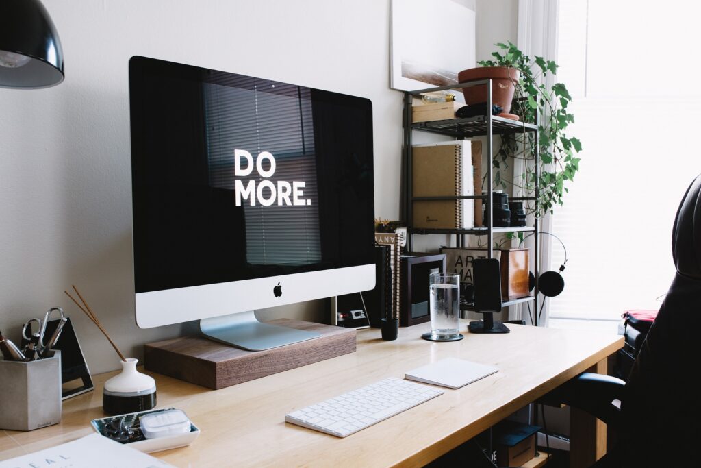 Computer in Office Workspace - Do More promoting working with Michigan Thrives